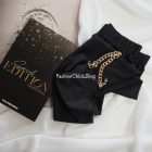 Calzedonia Special Edition szuperfényes harisnyanadrág levehető lánccal